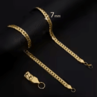 Platte Gourmet Ketting met bewerkte rand 7mm Goudkleurig Staal