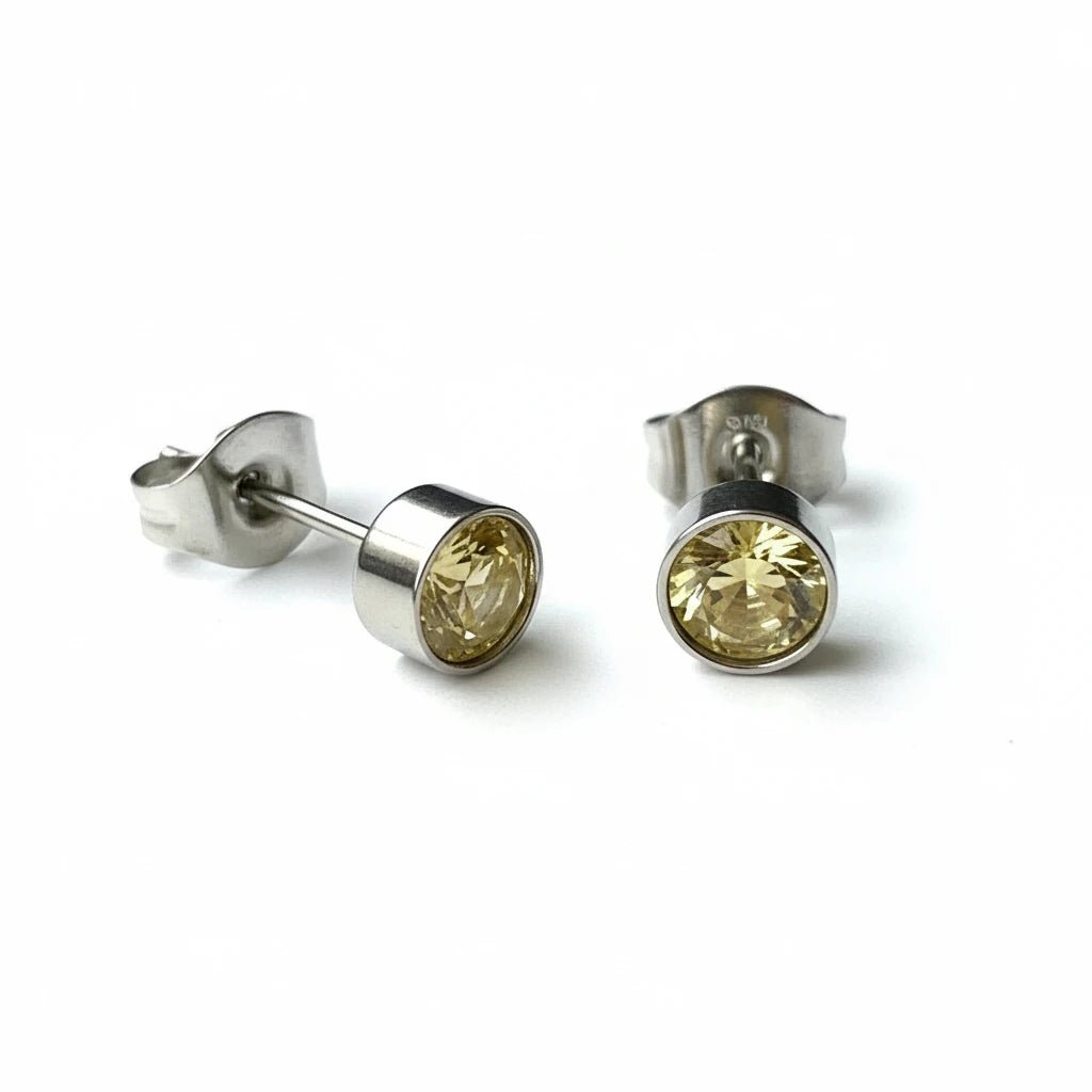 Oorstekers &acirc;&euro;&ldquo; Staal Kristal Geel Zilverkleur (5mm) -