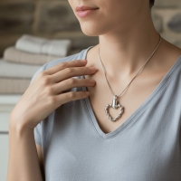 Gedraaide Hart Ashanger Open Staal &acirc;&euro;&ldquo; 3x2cm Uniek Gedenksieraad - Unisex