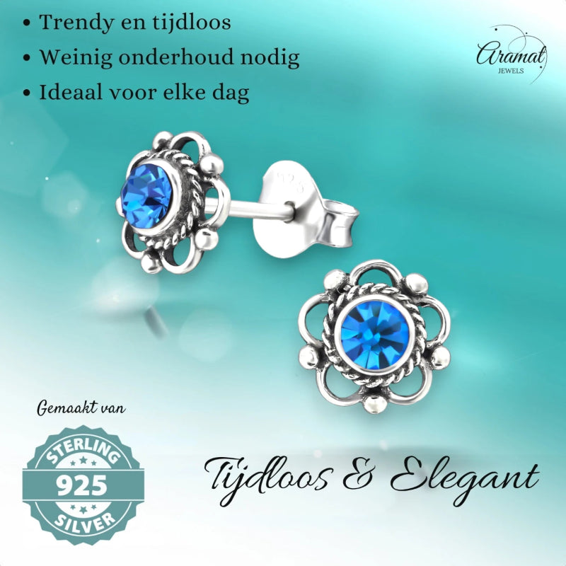Zilveren Bloemoorbellen Blauw 7 mm -