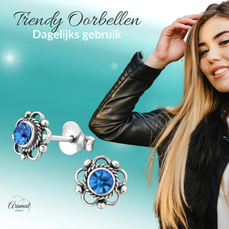 Zilveren Bloemoorbellen Blauw 7 mm -