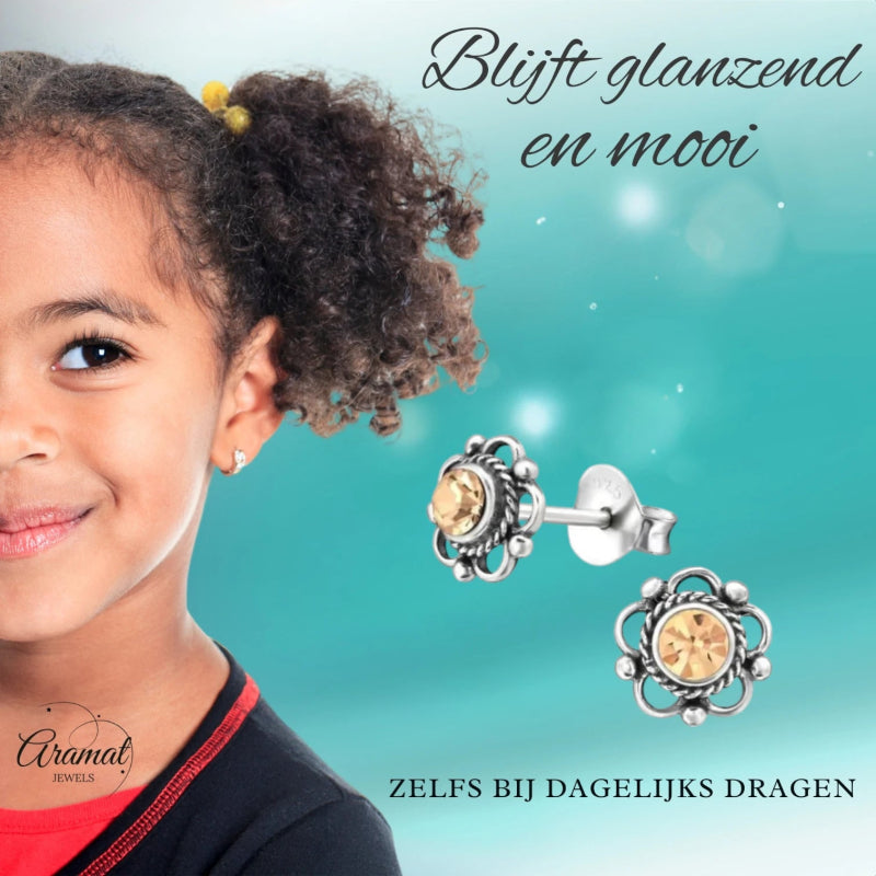 Zilveren Bloemoorbellen Oranje 7 mm -