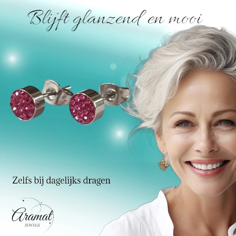 Zilverkleurige oorstekers met fuchsia roze kristallen &acirc;&euro;&ldquo; 6 mm -