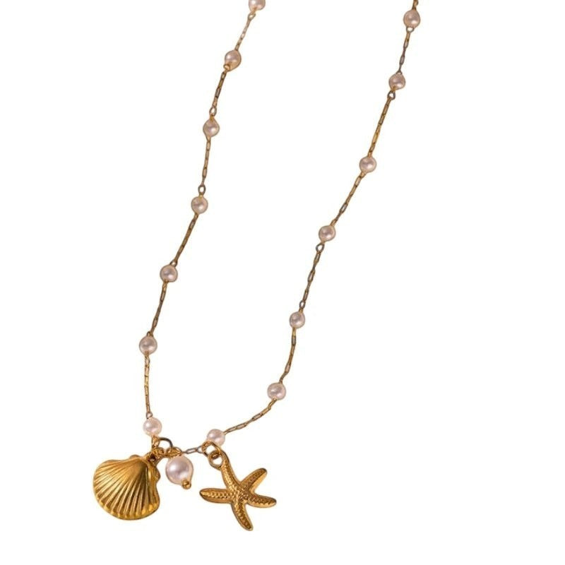 Goudkleurige parelketting met schelp & zeester &acirc;&euro;&ldquo; 40+5 cm - Dames