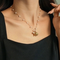 Goudkleurige parelketting met schelp & zeester &acirc;&euro;&ldquo; 40+5 cm - Dames