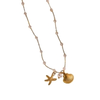 Goudkleurige parelketting met schelp & zeester &acirc;&euro;&ldquo; 40+5 cm - Dames