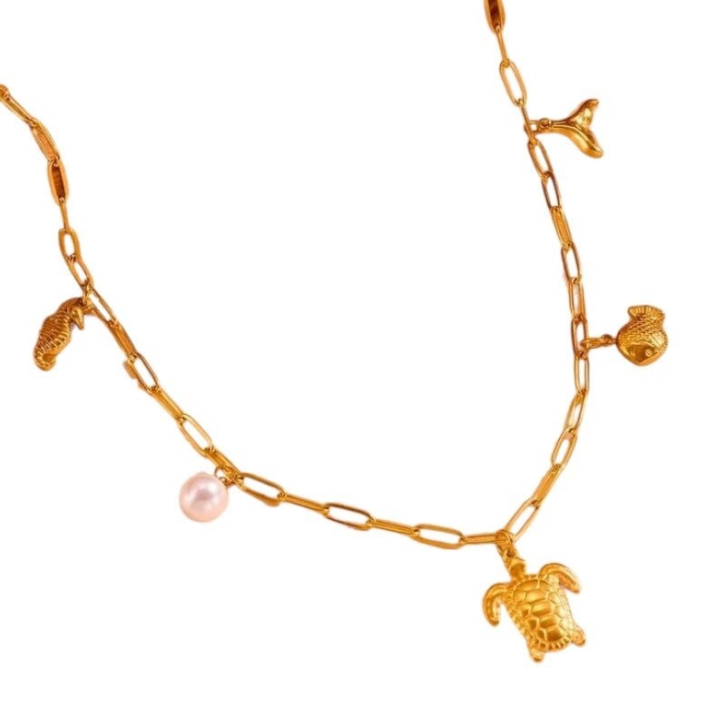 Goudkleurige damesketting met parel & zee-bedels &acirc;&euro;&ldquo; 45 cm - Dames