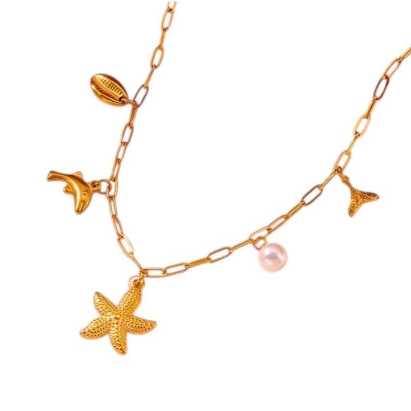 Goudkleurige damesketting met zee-bedels en parel &acirc;&euro;&ldquo; 45 cm - Dames