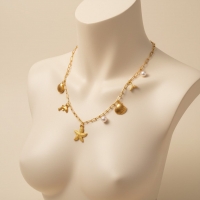 Goudkleurige damesketting met zee-bedels en parel &acirc;&euro;&ldquo; 45 cm - Dames