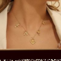 Goudkleurige damesketting met kristal en bedels - Dames