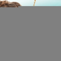 Goudkleurige damesketting met schelp- en parelbedels - Dames
