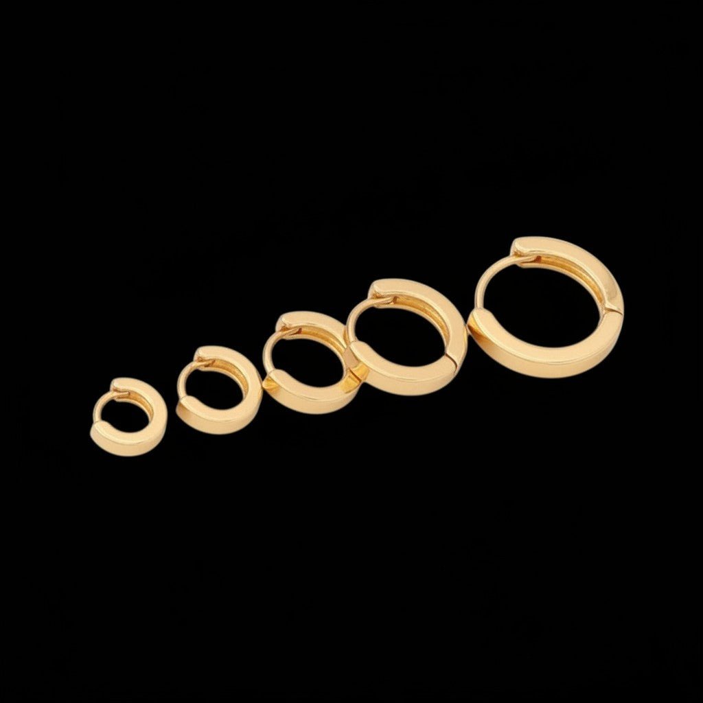 Goudkleurige stainless steel oorringen set &acirc;&euro;&ldquo; 3 maten ronde huggies &acirc;&euro;&
