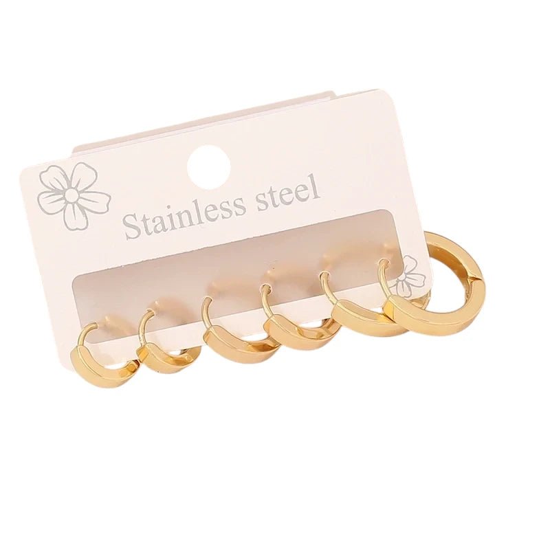 Goudkleurige stainless steel oorringen set &acirc;&euro;&ldquo; 3 maten ronde huggies &acirc;&euro;&