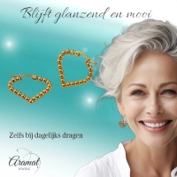 Goudkleurige stainless steel druppelvormige oorringen met bolletjesmotief &acirc;&euro;&ldquo; 33 mm