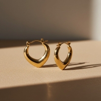 RVS druppelvormige oorringen 22mm &acirc;&euro;&ldquo; Goudkleurige hoops -
