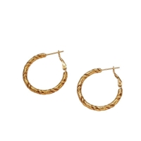 Ronde Oorringen RVS Goudkleurig &acirc;&euro;&ldquo; 25mm &acirc;&euro;&ldquo; Gedraaid Motief -