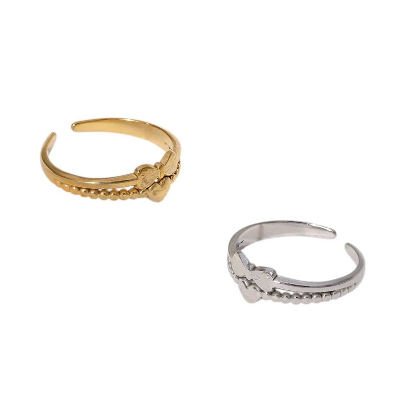 Stalen Damesring - Strikje & Hartje - 7mm - Goudkleur -