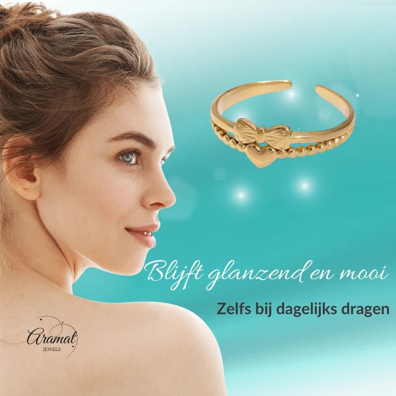 Stalen Damesring - Strikje & Hartje - 7mm - Goudkleur -