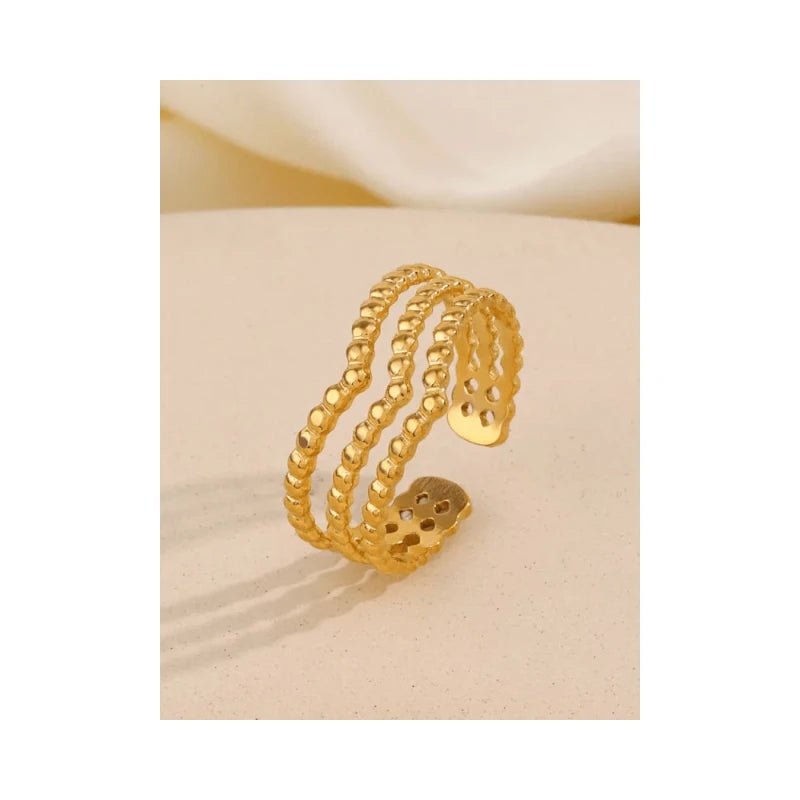 Brede Stalen verstelbare ring -V shape met bolletjes motief - Goudkleur -