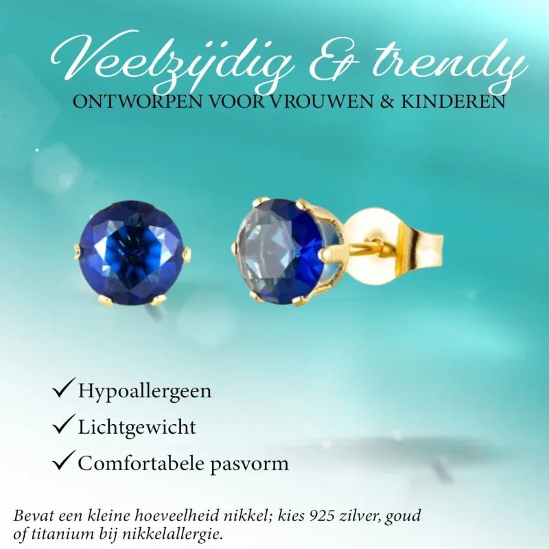 Goudkleurige Oorbellen Met Donkerblauwe Zirkonia -