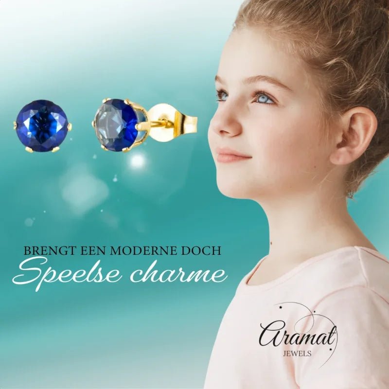 Goudkleurige Oorbellen Met Donkerblauwe Zirkonia -