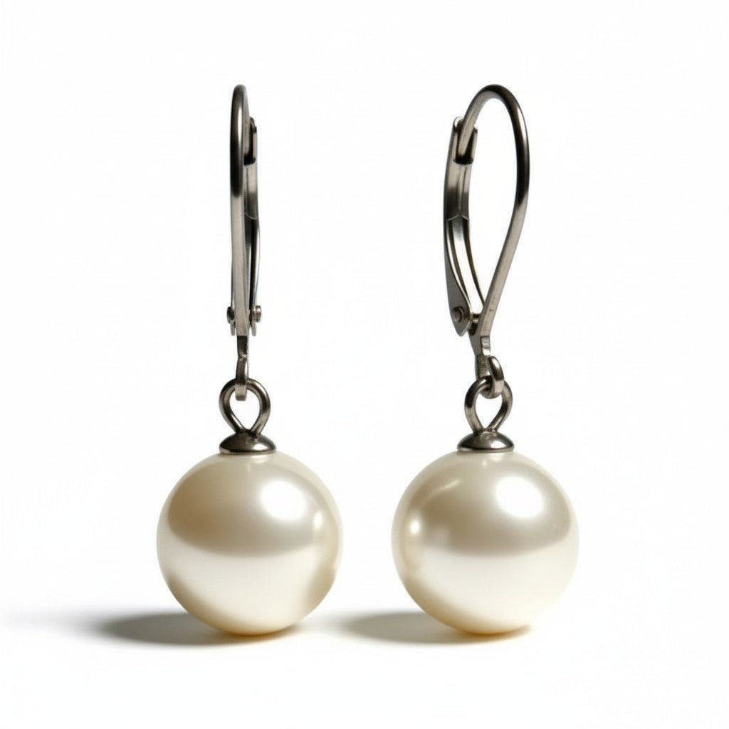 Oorhangers &acirc;&euro;&ldquo; RVS met Ronde Witte Parel (27mm) -