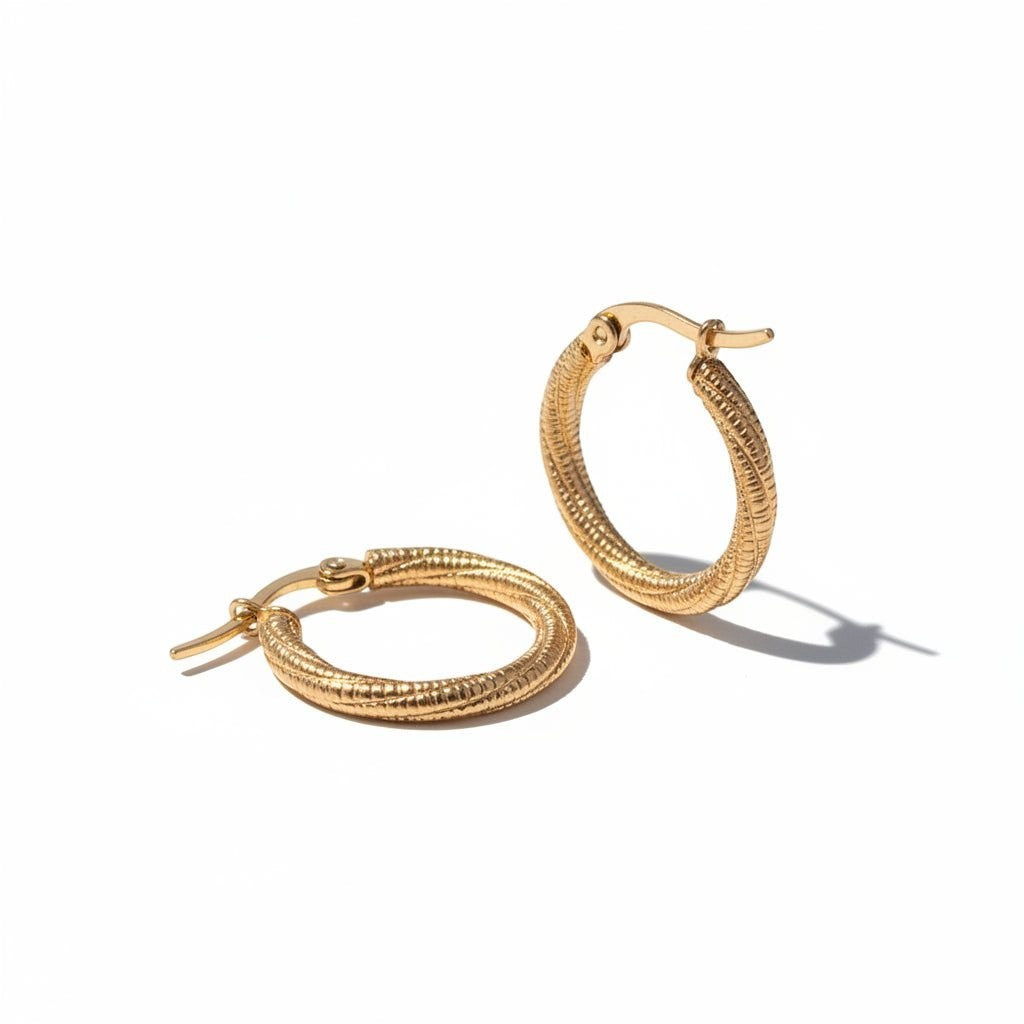 Goudkleurige Gedraaide RVS Hoepeloorbellen - Gediamanteerd - 20 mm -