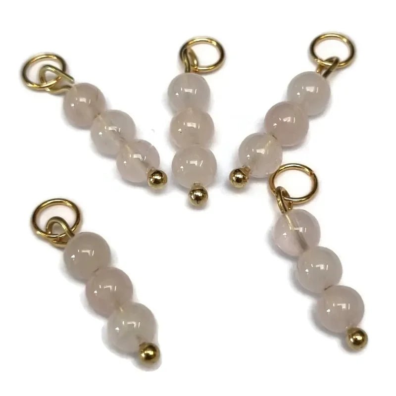 Lichtroze Kwarts charms natuursteen - Goudkleur - Unisex