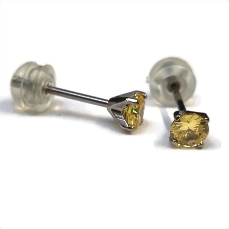 Ronde Titanium Oorbellen Geel 4mm met Zirkonia - Aramat -