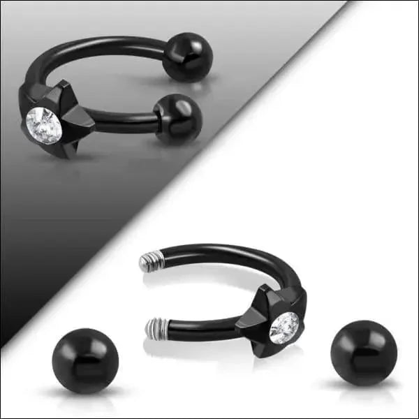 Zwarte oorpiercing met ster - Unisex