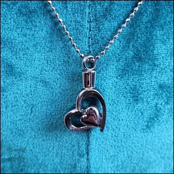 Stalen Hart Ashanger &acirc;&euro;&ldquo; Zilverkleurig Assieraad RVS Gedenksieraad - Hart met vleug