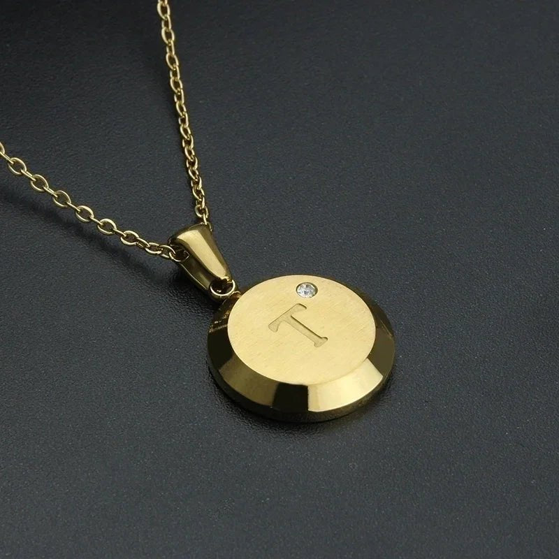 Goudkleurige Initiaal Ketting met Zirkonia Steentje - 45cm - T - Unisex