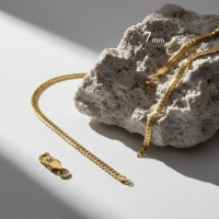 Platte Gourmet Ketting met bewerkte rand 7mm Goudkleurig Staal - 60cm - Unisex