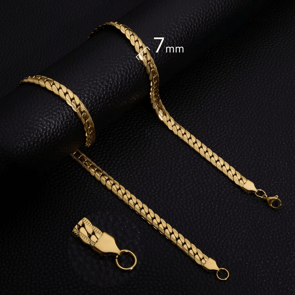 Platte Gourmet Ketting met bewerkte rand 7mm Goudkleurig Staal - 55cm - Unisex