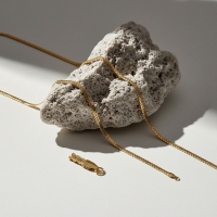 Platte Gourmet Ketting met bewerkte rand 4mm Goudkleurig Staal - 60cm - Unisex