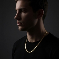 Platte Gourmet Ketting met bewerkte rand 6mm Goudkleurig Staal - 60cm - Unisex